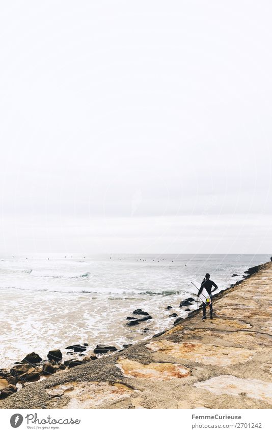 Surfer at the Atlantic Ocean 1 Mensch Natur Bewegung Freiheit Atlantik Portugal Surfen Küste Sandstrand Wellengang Wolken Ferien & Urlaub & Reisen