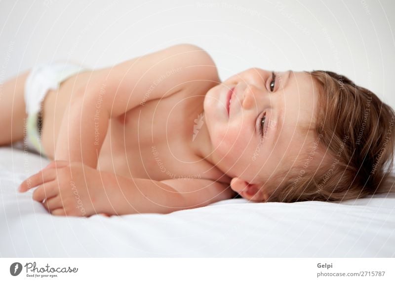 Baby mit einem Jahr aufstehen aus dem Bett Freude Glück schön Haut Gesicht Leben Kind Mensch Kleinkind Junge Mann Erwachsene Kindheit Lächeln schlafen