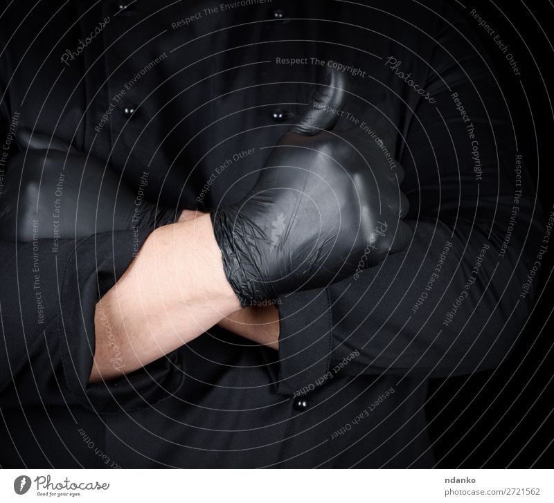 Koch in schwarzer Uniform zeigt Geste wie z.B. Stil Küche Restaurant Beruf Mann Erwachsene Hand Bekleidung Jacke gut Knöpfe Kaukasier Küchenchef Entwurf
