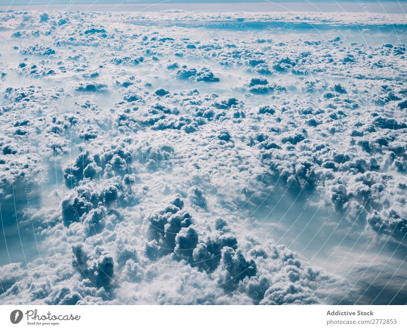 Flauschige Wolken im Sonnenlicht flockig Himmel Kumulus Landschaft Dunst Klima Umwelt Licht Wolkenlandschaft hell Weltall Beautyfotografie Natur Atmosphäre