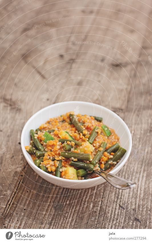 linsencurry Lebensmittel Gemüse Curry Bohnen Linsen Ernährung Mittagessen Bioprodukte Vegetarische Ernährung Geschirr Schalen & Schüsseln Besteck Gabel