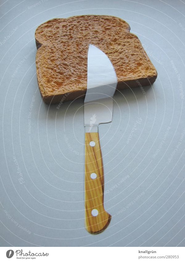 Streichzart Lebensmittel Teigwaren Backwaren Toastbrot Ernährung Besteck Messer liegen außergewöhnlich eckig lecker braun grau Gefühle Freude Design Kreativität