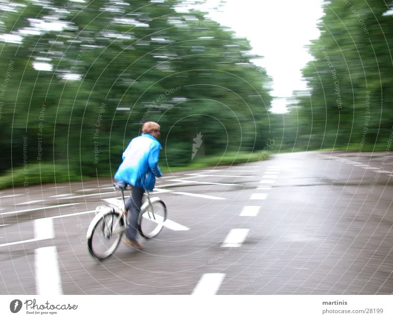 fahrradaction Fahrrad Geschwindigkeit fahren Mann Straße Unschärfe