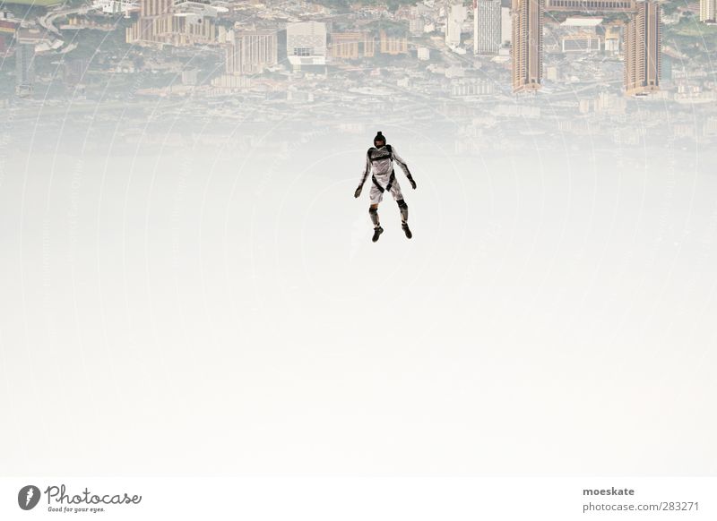 Die Welt steht Kopf Lifestyle Freizeit & Hobby Mensch maskulin Mann Erwachsene 1 Kuala Lumpur Malaysia Asien Stadtzentrum Skyline fliegen springen