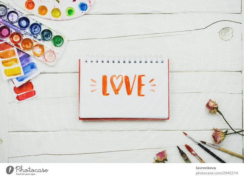 Skizzenbuch mit Griffschrift "Liebe". Notizbuch Künstler Bürste Business mehrfarbig Entwurf Kreativität Dekoration & Verzierung Design Schreibtisch Gemälde