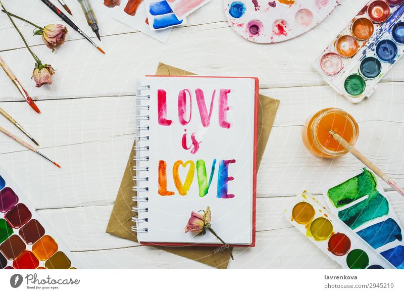 Skizzenbuch mit Griffschrift "Liebe ist Liebe". Künstler Hintergrund schön Bürste Business mehrfarbig Entwurf Kreativität Dekoration & Verzierung Design