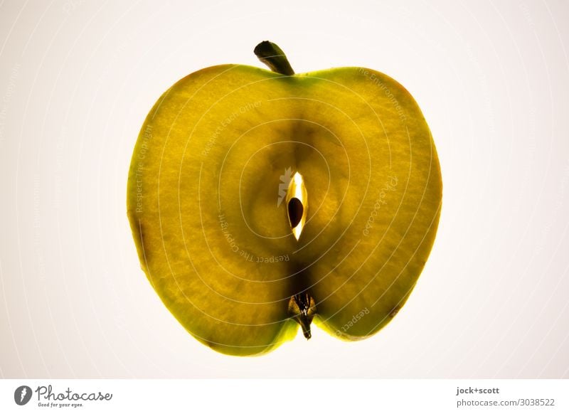 Apfelscheibe (mit Schale) Kerngehäuse Oval Scheibe dünn lecker süß Design Symmetrie Querschnitt durchleuchtet geschnitten Leuchtkasten assoziativ Logo