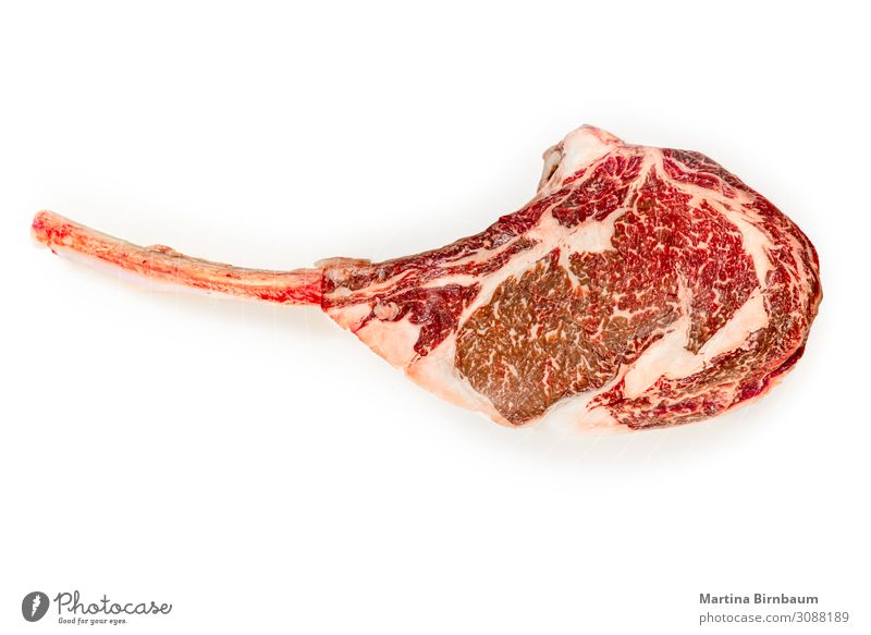 Dry aged raw tomahawk beef steak isolated on white background Fleisch lecker reich rot wagyu ribeye meat Hintergrundbild angus dry bone wet bloody barbecue