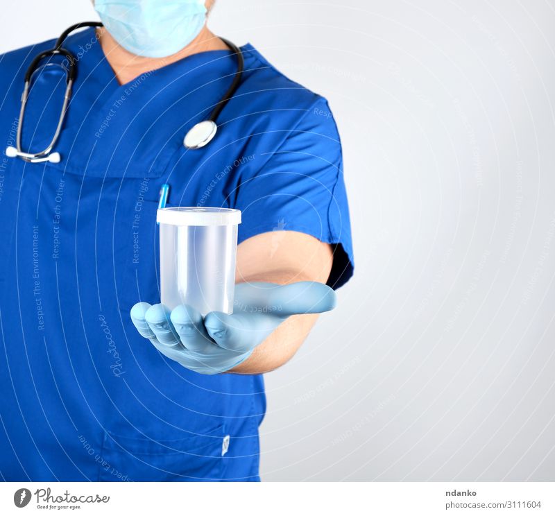 Arzt in blauer Uniform und Latexhandschuhen Behandlung Krankheit Medikament Wissenschaften Labor Prüfung & Examen Krankenhaus Mensch Mann Erwachsene Hand