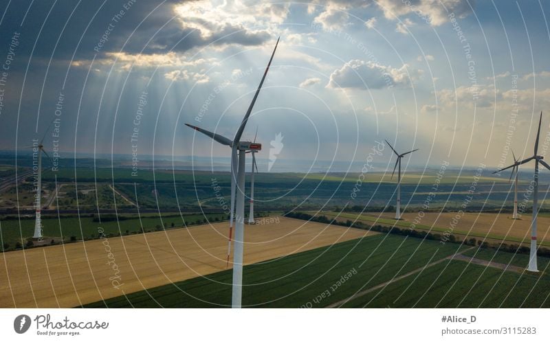 aerial view of wind turbines field energy Natur Wind Kraft innovativ Umwelt Umweltschutz agriculture clouds conservation dawn drone ecology electric electricity