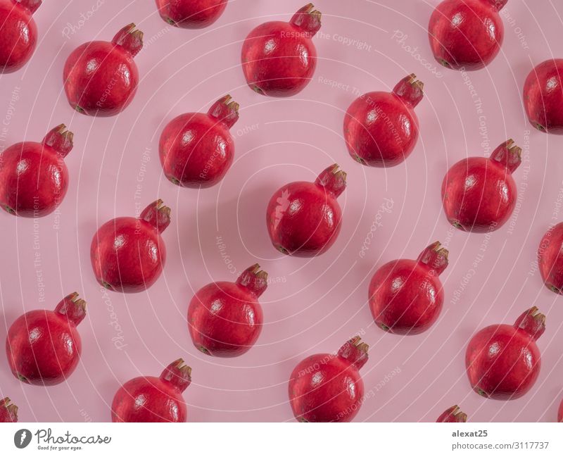 Granatapfelmuster auf rosa Hintergrund Frucht Saft Design Sommer Dekoration & Verzierung Natur frisch natürlich rot Farbe farbenfroh Entwurf Element