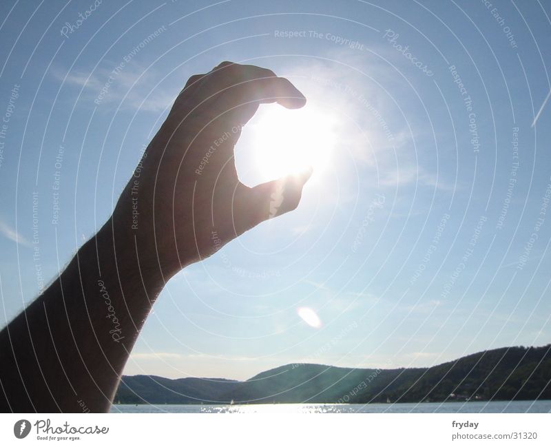 SunCatcher Hand umschließen Sonne fangen wolkenfrei Himmel