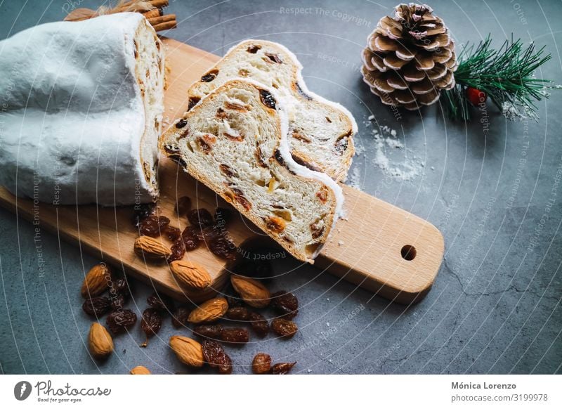 Weihnachtsstollen mit Zimt, Anis und Mandeln. Frucht Brot Dessert Kräuter & Gewürze Winter Feste & Feiern Tradition Zucker Ingwer süß Scheibe Pasteten orange