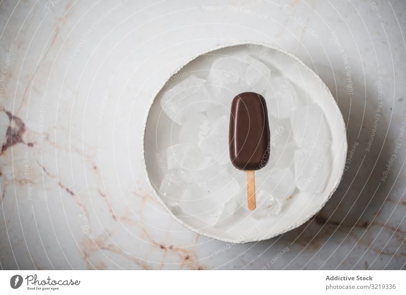 Schokoladen-Eis am Stiel Speiseeis Vanille Mandel Sahne Hintergrund Sommer Dessert lecker kleben Lebensmittel braun süß kalt geschmackvoll Geschmack Molkerei