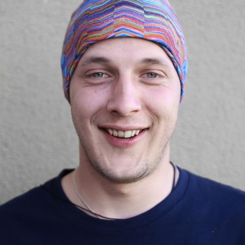 chillin' maskulin Mann Erwachsene 1 Mensch Schauspieler Mauer Wand Pullover Kopftuch Dreitagebart Erholung genießen Lächeln lachen Blick Lebensfreude Optimismus