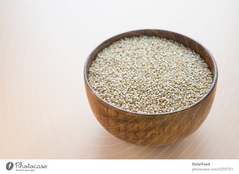 Weiße Quinoa-Samen in Holzschale Ernährung Schalen & Schüsseln frisch Gesundheit Chenopodium Hintergrund brauner Hintergrund Müsli diätetisch Diät Lebensmittel