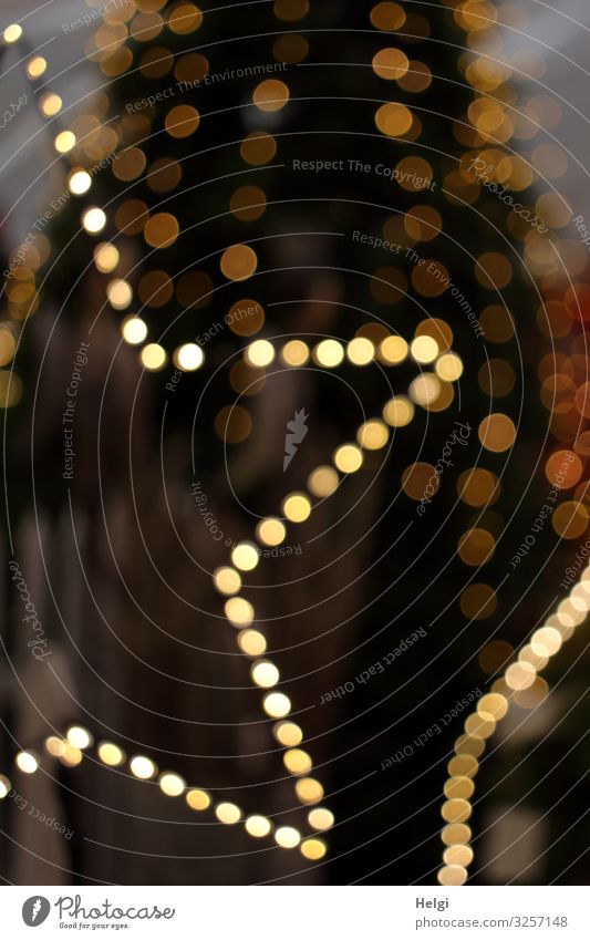 Lichtpunkte in Form eines Sterns vor dunklem Hintergrund mit Bokeh Feste & Feiern Weihnachten & Advent Weihnachtsbaum Lichterkette Zeichen Stern (Symbol)