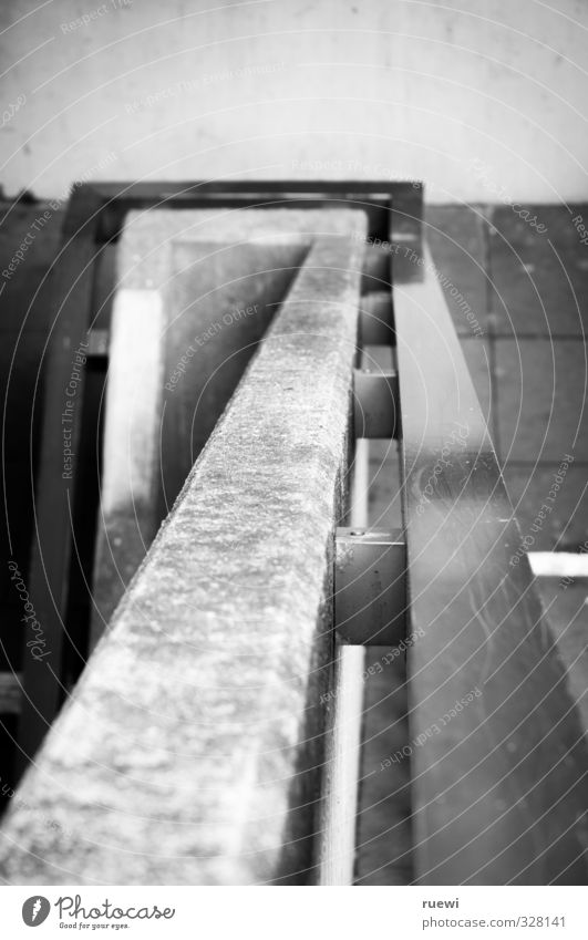 Abwärtsspirale, mit Ecken und Kanten Baustelle Karriere Menschenleer Gebäude Architektur Treppe Wege & Pfade Treppengeländer Stein Beton Metall bauen Bewegung