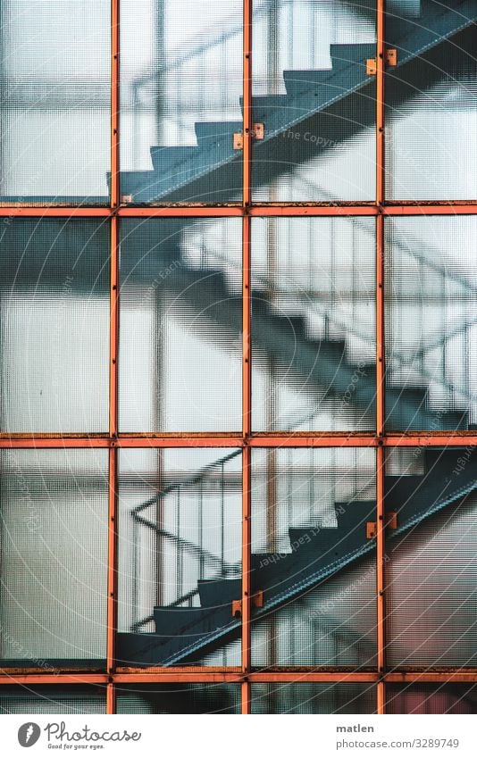 Treppenhaus Stadt Hochhaus Architektur ästhetisch blau grau orange Gedeckte Farben Außenaufnahme Muster Strukturen & Formen Licht Schatten Kontrast