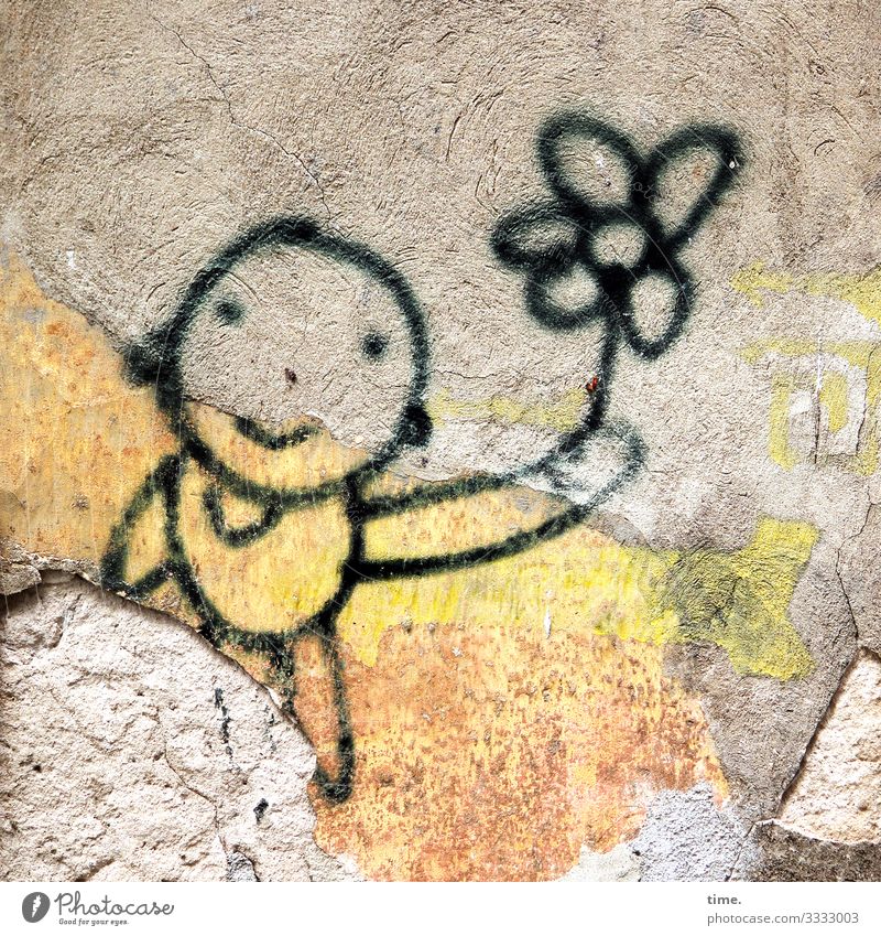 Dresdener Flower Boy stein grafitti kind blume zeichnung fröhlich märchen phantasie gelb strichmännchen freude inspiration halten lächeln gelassenheit kaputt