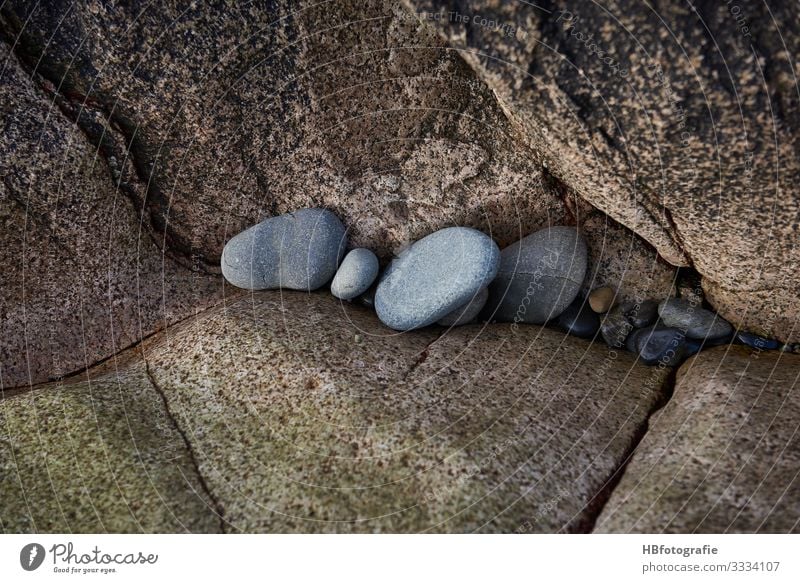 Steine Kunst Natur Küste Meer Gefühle Gedanke Kieselstrand Kieselsteine Felsküste Felsen Farbfoto Außenaufnahme Menschenleer Textfreiraum unten Tag