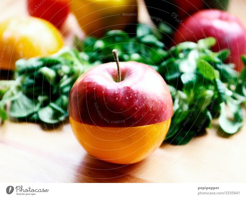ApfelSine Lebensmittel Salat Salatbeilage Frucht Orange Ernährung Essen Frühstück Picknick Bioprodukte Vegetarische Ernährung Diät grün rot Farbfoto