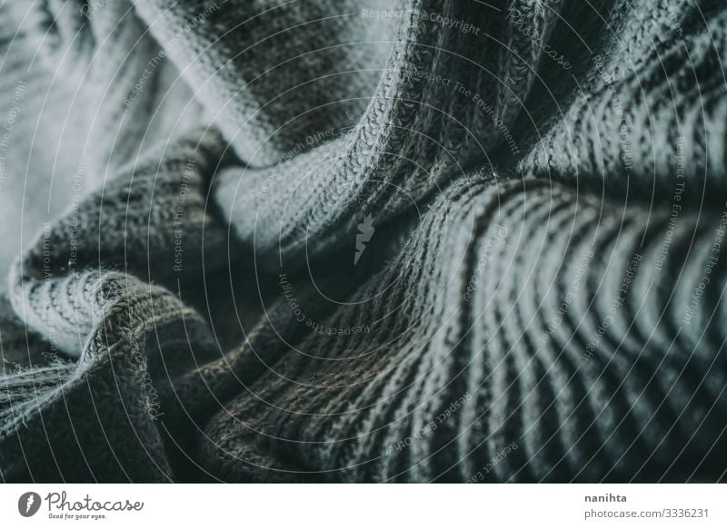 Detail der warmen Wollkleidung Wolle Wollstoff Textur Textil weich Winter Oberfläche Kontrast winken grau Monochrom Kleidung Bekleidung Mode Tapete abstrakt