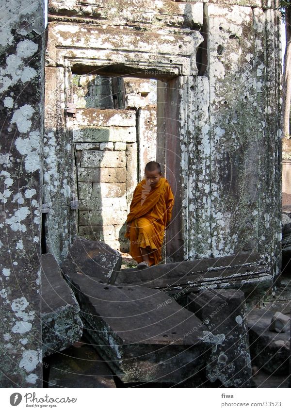 Mönchsjunge in Ankor Kind Ruine ruhig Mann Junge orange Buddismus