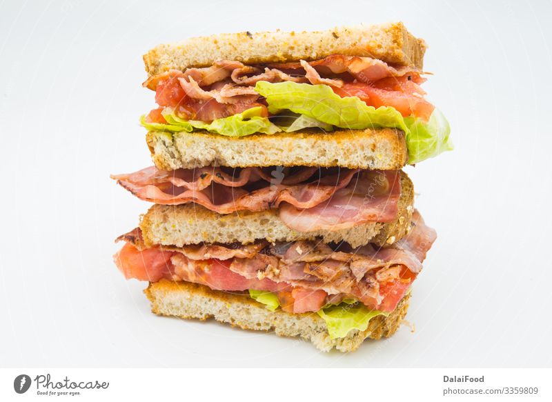 Ein BLT ist eine Art Sandwich Brot Fastfood Tradition Speck blt blt-Sandwich Cholesterin Club-Sandwich Böden Lebensmittel vereinzelt Salat Mahlzeit