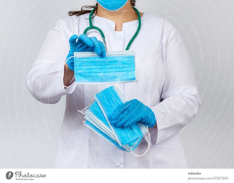 schützende Gesichtsmasken Gesundheitswesen Behandlung Krankheit Medikament Labor Arbeit & Erwerbstätigkeit Beruf Arzt Krankenhaus Mensch Frau Erwachsene Hand