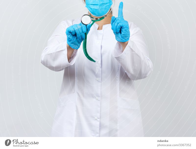 Medizinerin im weißen Kittel und mit Maske Gesundheitswesen Behandlung Krankheit Medikament Arbeit & Erwerbstätigkeit Beruf Arzt Krankenhaus Werkzeug Mensch