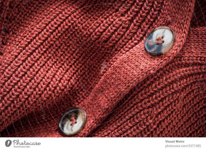 Strickjacke aus Naturwolle Design Winter Industrie Mode Bekleidung dick natürlich rot Geborgenheit bequem Farbe Hintergrund Strickwaren stricken Textil