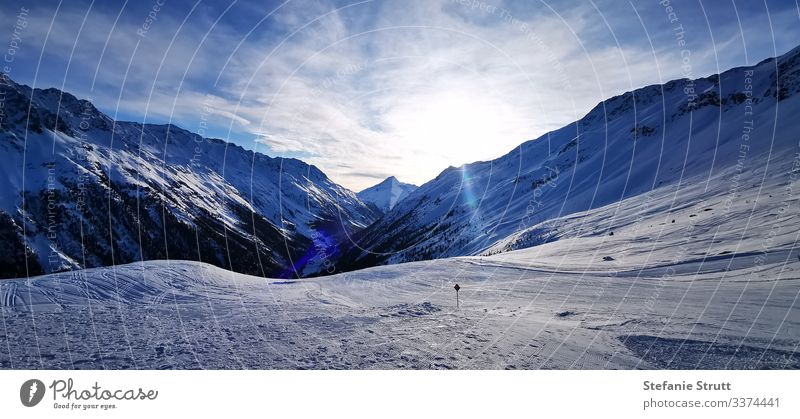 Pistenparadies im Sonnenuntergang Panorama (Aussicht) Licht Menschenleer Bewegung Ferne Schneebedeckte Gipfel Berge u. Gebirge Natur Landschaft Himmel Alpen