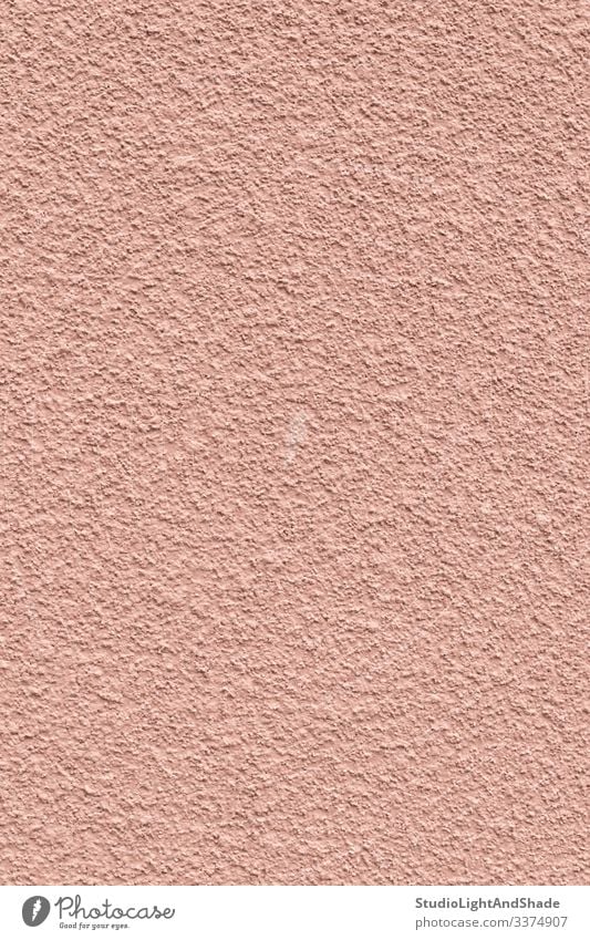 Strukturierte rosa Wand gemalt Stein Hintergrund Textur abstrakt Oberfläche staubig-rosa Pastell Beton texturiert körnig elegant feminin Detailaufnahme