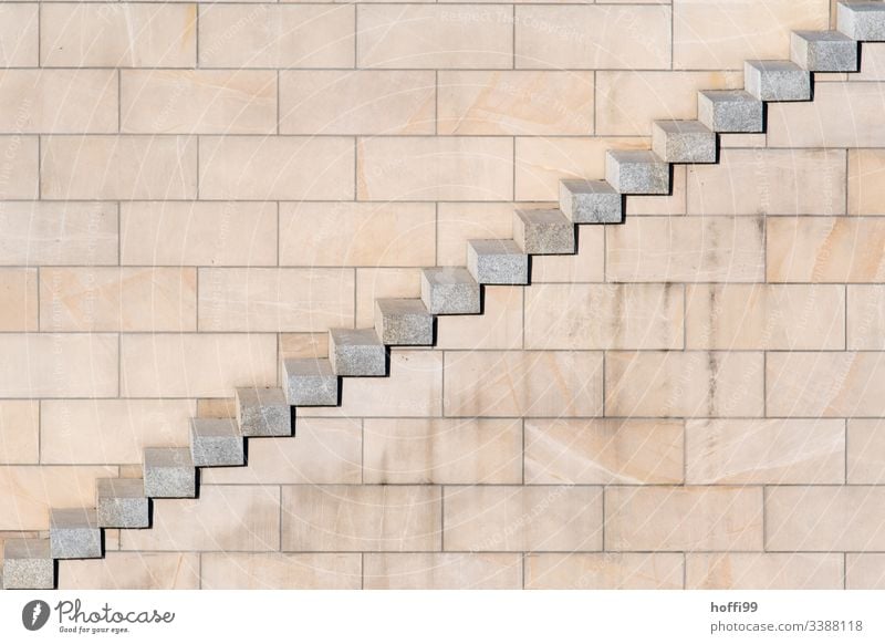 Diagonale Stufen mit Sandstein Mauer diagonal Wand Baustein minimalistisch Stufenordnung stufen Treppe Treppenansatz Steinwand Ordnung Linien Muster