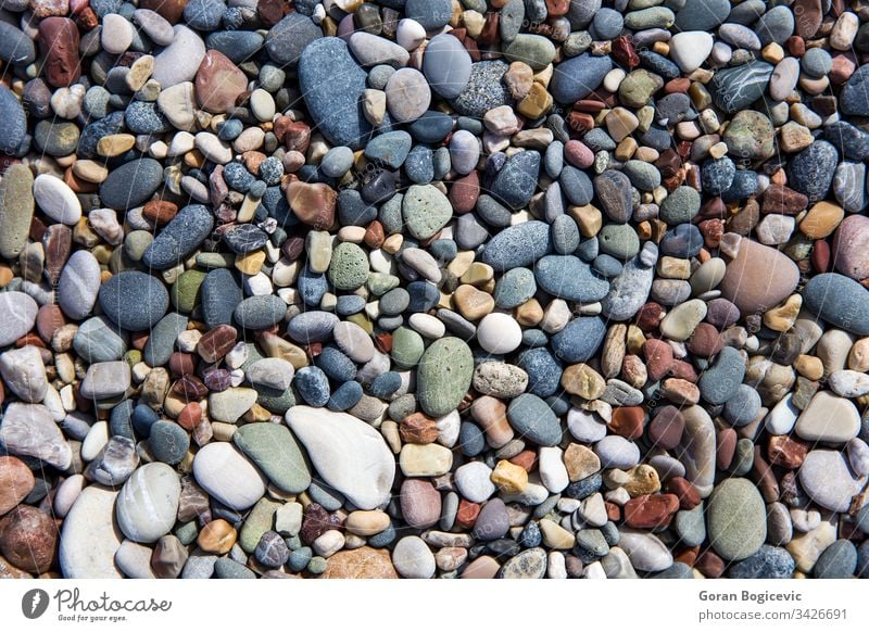 Nahaufnahme der Kieselsteine am Strand Hintergrund Natur Sommer Stein Textur sanft Küste Felsen Oberfläche abstrakt Material Seeküste trocknen Haufen farbenfroh
