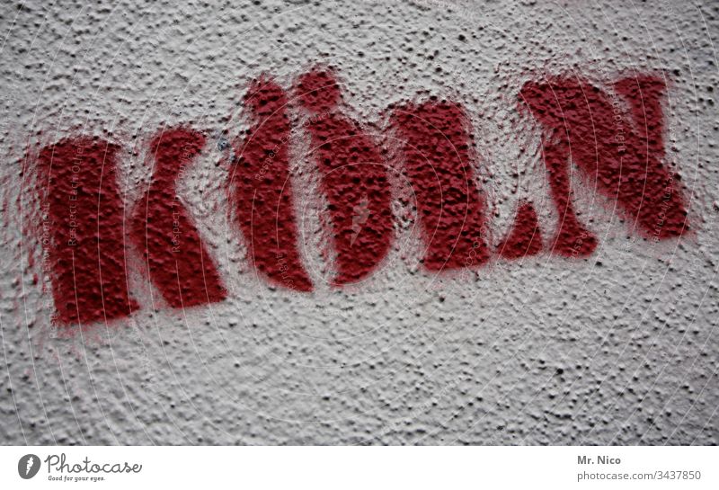 Köln Druck Wand Putzfassade rot weiß NRW Stadt Großstadt Kölsch Karneval Köln-Deutz Köln-Ehrenfeld Grafik u. Illustration Graffiti Stempel Schriftzeichen
