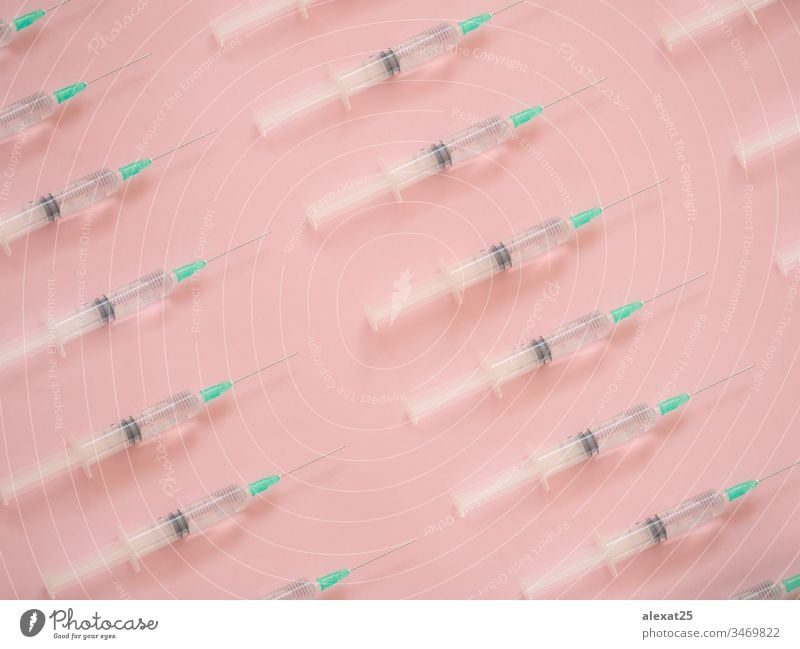Spritzenmuster auf rosa Hintergrund Antibiotikum Coronavirus covid-19 Krankheit Dosis Medikament Seuche Gerät Gesundheit Krankenhaus Infektion spritzen