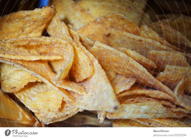 Tortilla-Chips Nachos nachos Lebensmittel Mahlzeit Snack Nahaufnahme geschmackvoll Farbfoto Kartoffeln rustikal lecker Snacks Knappe Ressourcen mexikanisch