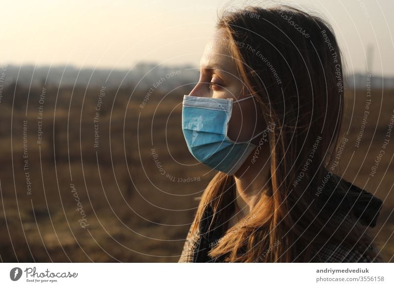 Nahaufnahme des Fotos einer Frau mit Schutzmaske gegen Infektionskrankheiten, Coronavirus, Covid-19 und Grippe im Freien. copy space. Ausbruch des Coronavirus in Europa. Prävention der Ausbreitung von Grippeepidemien