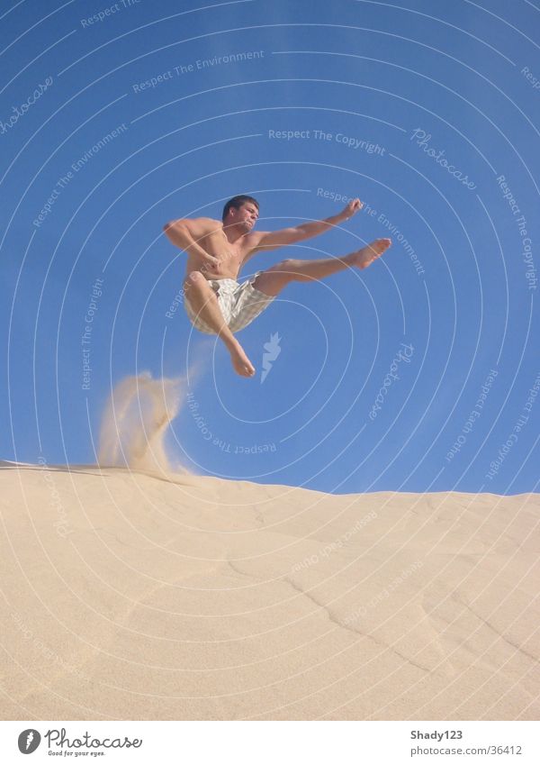 sand_samurai Ferien & Urlaub & Reisen springen Luft Kampfsport Mann Sand