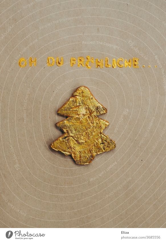 Oh du fröhliche Weihnachtszeit. Goldene Schrift mit goldenem Tannenbaum. Weihnachten. Weihnachtskarte edel oh du fröhliche Weihnachtslied text singen