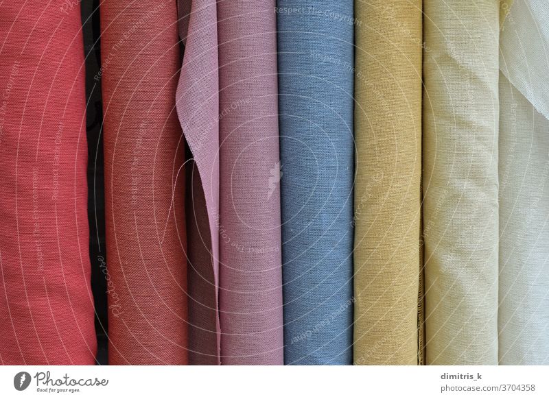 textiles Gewebematerial in verschiedenen Farben Brötchen Textil Hintergrund Monochrom Material Großhandel texturiert farbenfroh gerollt Beispiele Tonung