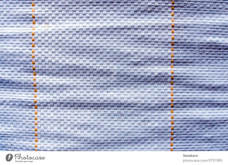 Textur einer großen gewebten Plastiktüte Tasche Kunststoff Verpackung Sack Laden Lager Material Industrie Reihe synthetisch Polyester weiß texturiert Oberfläche