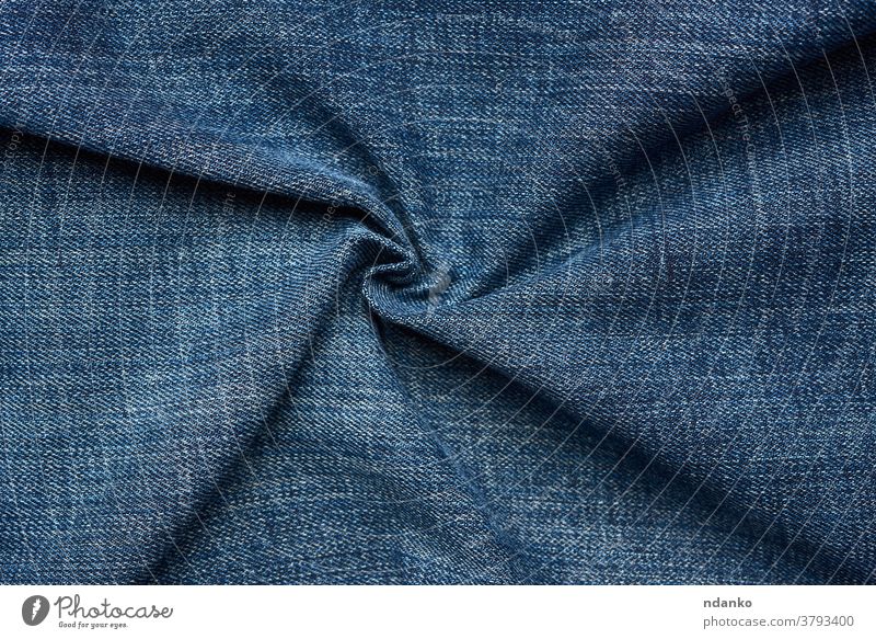 gelockte Blue-Jeans-Textur, Vollrahmen Bekleidung Hintergrund blau Leinwand lässig Nahaufnahme Stoff Farbe Baumwolle dunkel Jeansstoff Design Detailaufnahme