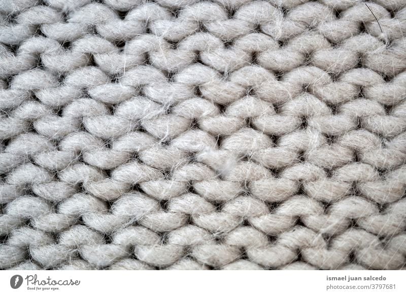 weiße Wolle, Tuch handgefertigt Faser grau Gewebe Stoff texturiert abstrakt Hintergrund Muster Material Industrie Textil Design Detailaufnahme Makro stricken