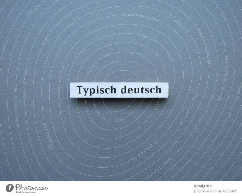 Typisch deutsch charakteristisch Stereotyp typisch deutsch Deutsch Erwartung Deutschland Buchstaben Wort Satz Letter Typographie Text Sprache Schriftzeichen