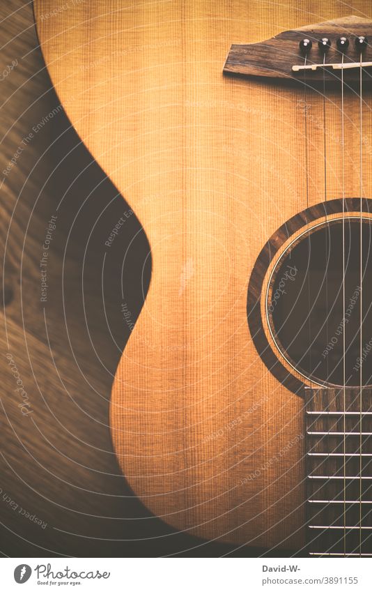 Musikinstrument - Gitarre liegt auf dem Boden Kultur Leidenschaft Freizeit & Hobby Design akustisch Holz