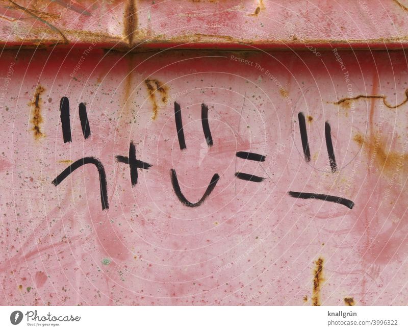 Gleichung in Bildsprache mit Emoticons Graffiti emotion Gesichtsausdruck Mauer Wand pluszeichen gleichheitszeichen Außenaufnahme Farbfoto Menschenleer Tag