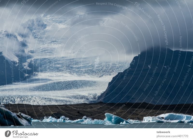 Wolkengletscher Natur Landschaft Urelemente Wasser Eis Frost Felsen Gletscher Seeufer groß Unendlichkeit kalt blau weiß enorm Vatnajökull Island Farbfoto